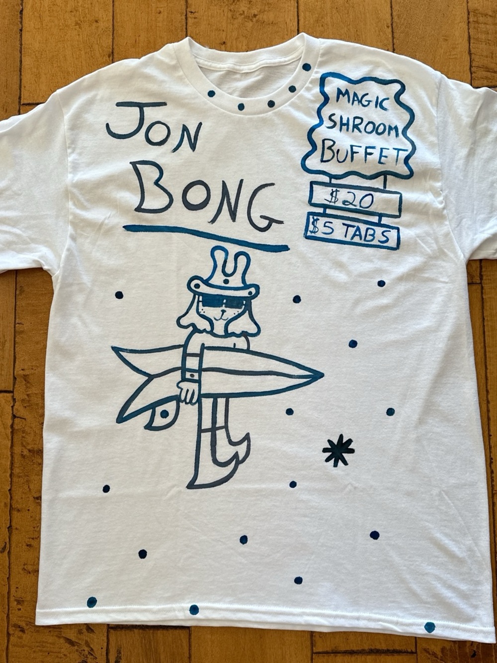 White Graphic Tee with Blue Hand-Drawn Surf Design